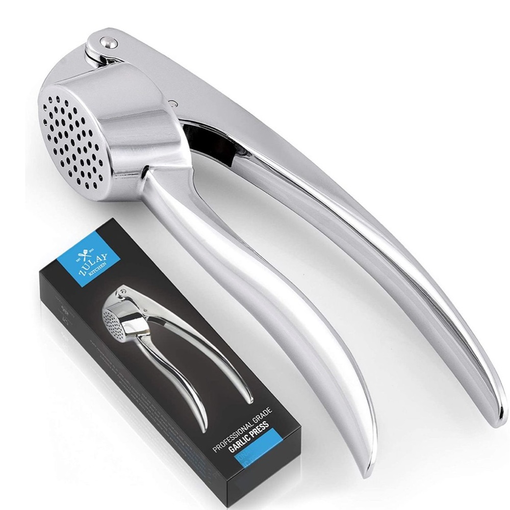 Brand new sealed never used garlic press